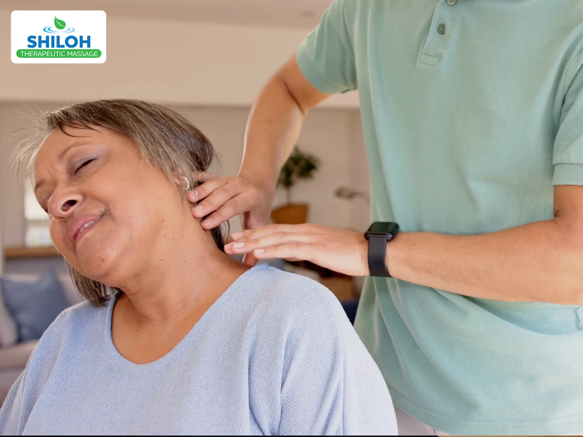 Massage therapist treating shoulder and neck pain in Billings MT