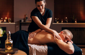 Massage therapist in Billings, MT, providing therapeutic massage for neck and shoulder tension