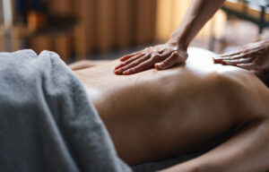 Massage therapist in Billings, MT, providing therapeutic massage to relieve muscle tension and support relaxation